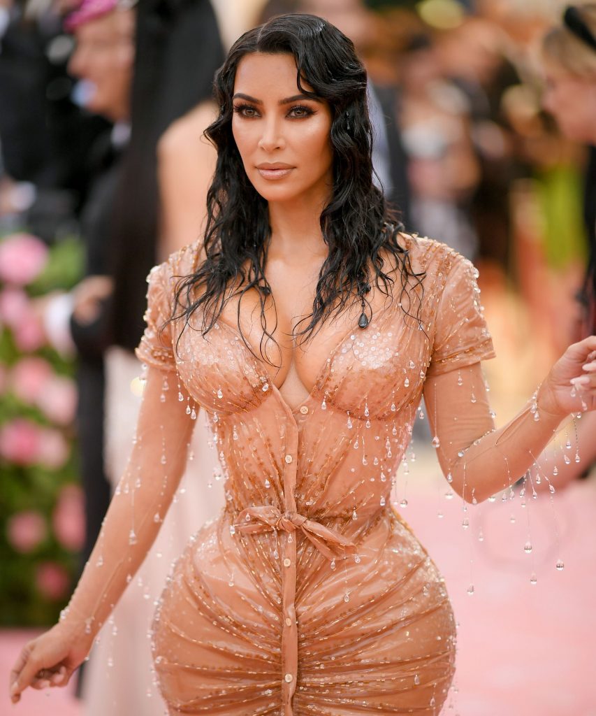 How Did Kim Kardashian Posed In An Insanely Micro Corset