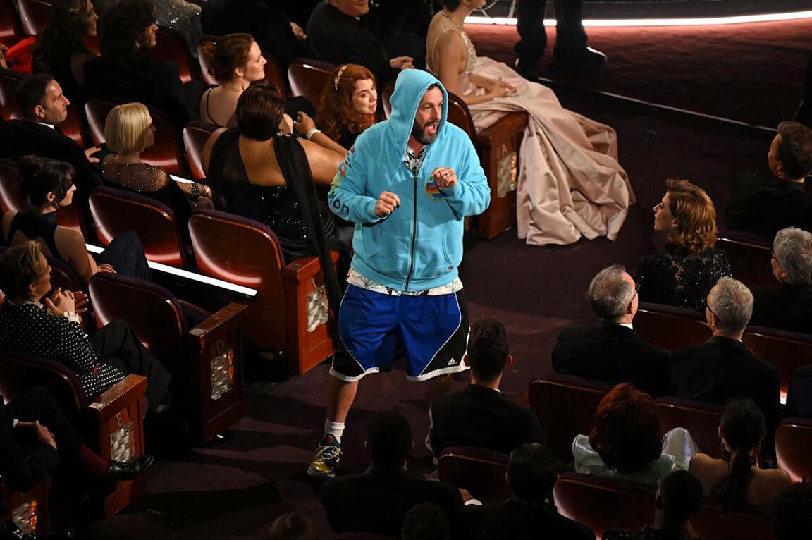 Adam Sandler Crashes the 2025 Oscars in a Hoodie and Basketball Pants